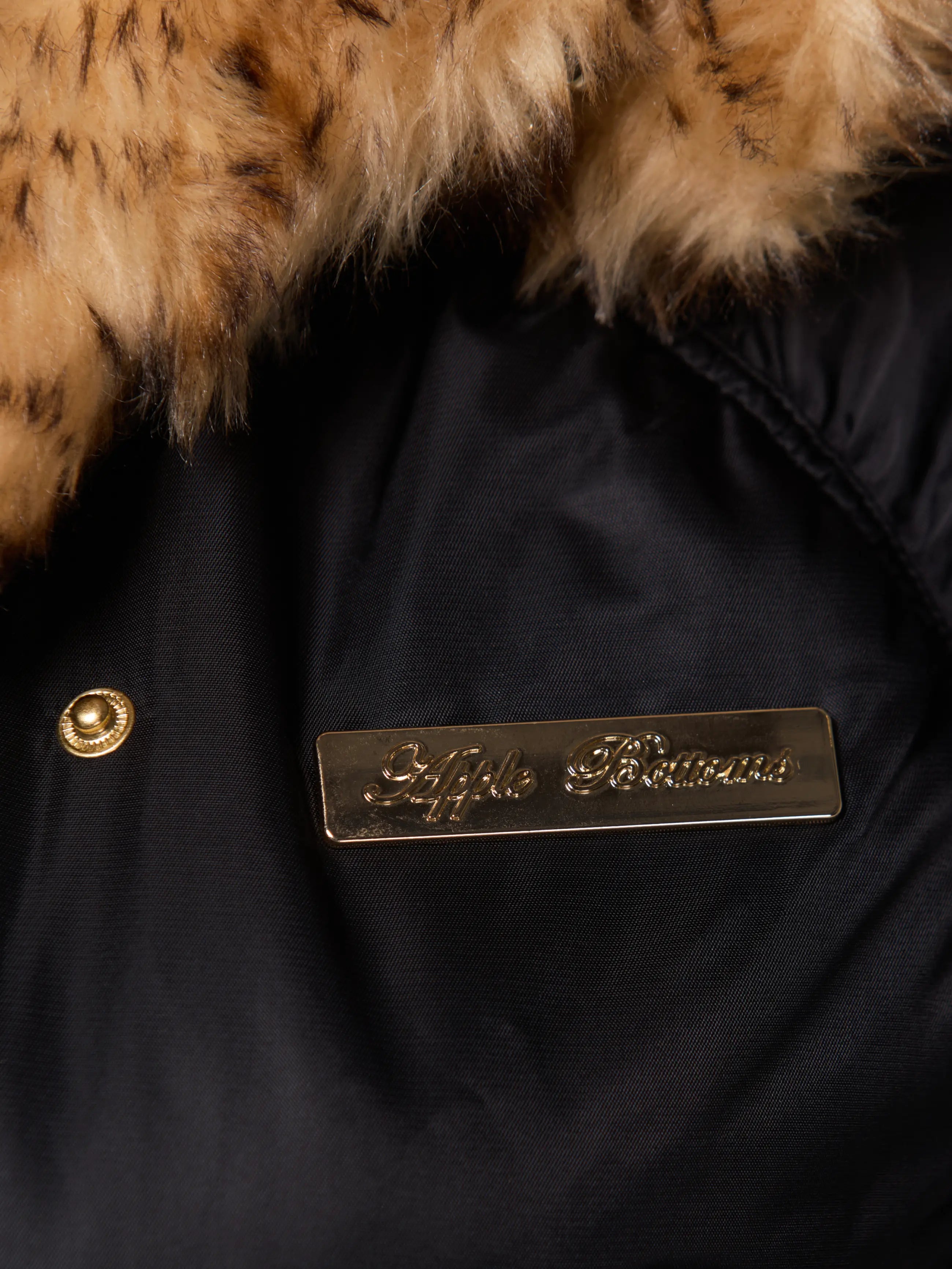 Reversible Fur/Nylon Puffer